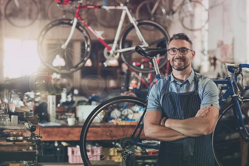 Modern bike shop interior showcasing various bicycle types and cycling gear