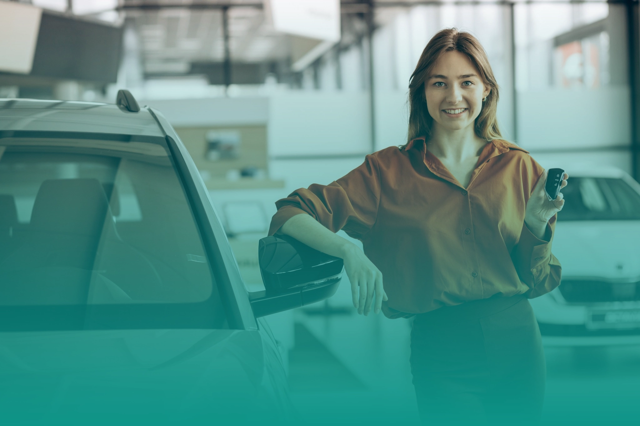 Professional car dealership showroom with modern automotive branding elements