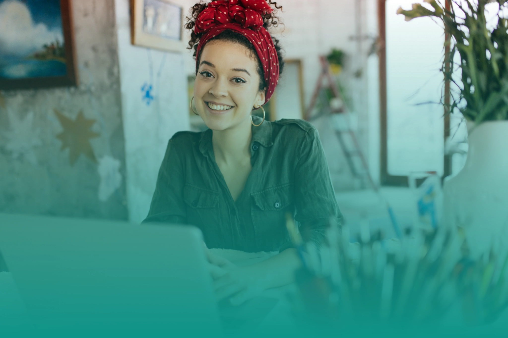 Professional graphic design studio workspace with creative branding elements and design tools