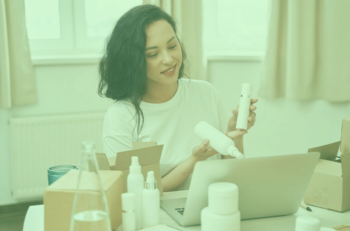 Professional skincare brand naming workspace with beauty products and branding materials