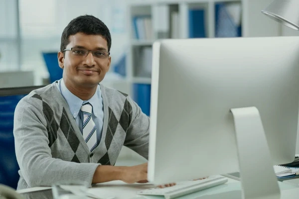 Professional web development company workspace showing modern branding elements